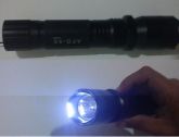 lanterna taser